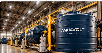 Rotational moulding equipment and finished Aquavolt tanks in a factory